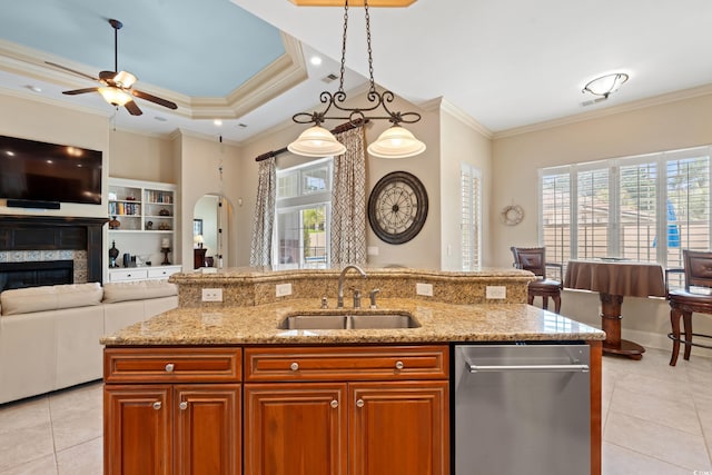 7545 Ventura Ct, Myrtle Beach, SC 29572 - kitchen featuring a sink, light tile patterned floors, ornamental molding, arched walkways, and a ceiling fan