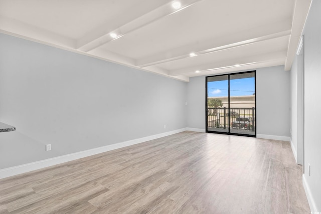 601 Mitchell Dr Unit 207, Myrtle Beach, SC 29577 - empty room featuring beam ceiling and light wood-style flooring