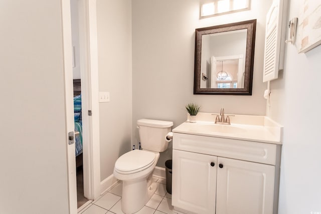 698 Riverwalk Dr Unit 304, Myrtle Beach, SC 29579 - bathroom featuring vanity, toilet, tile patterned floors, and baseboards