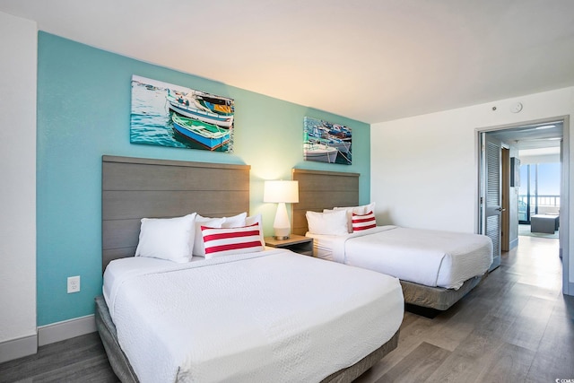 2401 S Ocean Blvd Unit 557, Myrtle Beach, SC 29577 - bedroom with wood finished floors and baseboards
