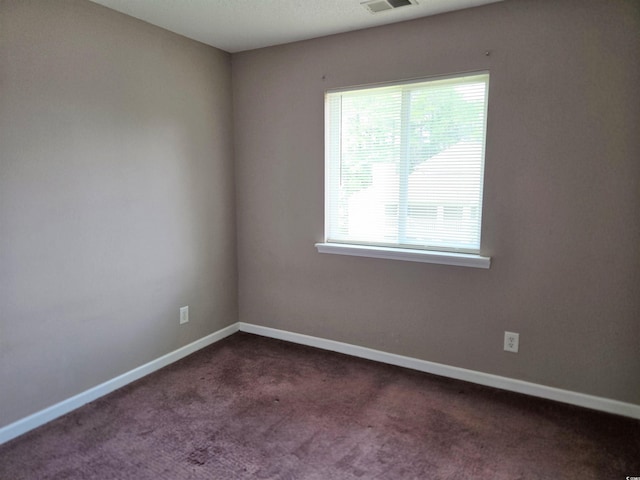 300-J Myrtle Greens Dr Unit J, Conway, SC 29526 - unfurnished room featuring dark colored carpet and baseboards