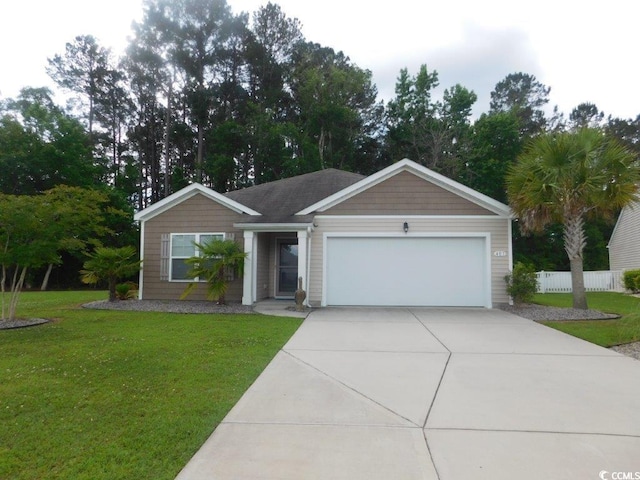 401 Quinta St, Longs, SC 29568 - ranch-style house with an attached garage and driveway