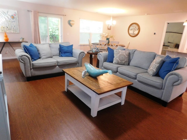 401 Quinta St, Longs, SC 29568 - living area featuring wood finished floors, healthy amount of natural light, and a chandelier