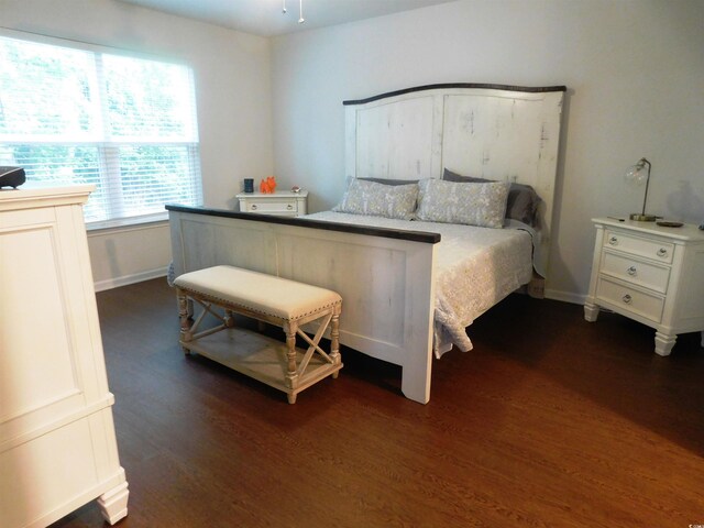 401 Quinta St, Longs, SC 29568 - bedroom with dark wood-style flooring and baseboards