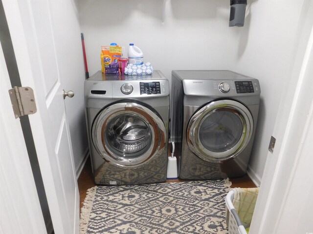 401 Quinta St, Longs, SC 29568 - laundry area featuring separate washer and dryer and wood finished floors