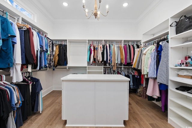 1058 E Isle Of Palms Ave, Myrtle Beach, SC 29579 - spacious closet featuring wood finished floors and a chandelier