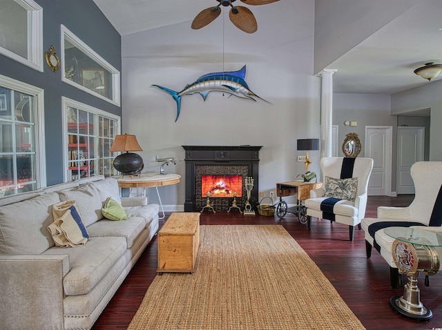1635 Southwood Dr, Surfside Beach, SC 29575 - living room with a warm lit fireplace, wood finished floors, a ceiling fan, lofted ceiling, and ornate columns