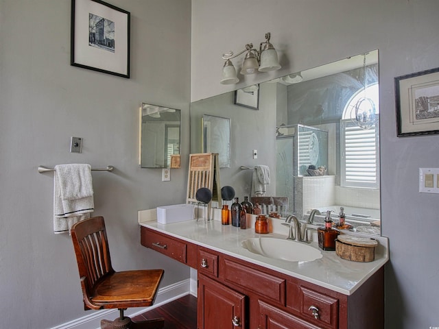1635 Southwood Dr, Surfside Beach, SC 29575 - full bath featuring a shower stall, vanity, wood finished floors, and a bath