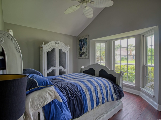 1635 Southwood Dr, Surfside Beach, SC 29575 - bedroom featuring multiple windows, vaulted ceiling, hardwood / wood-style flooring, and ceiling fan