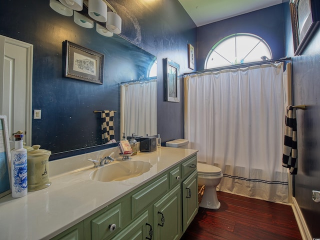1635 Southwood Dr, Surfside Beach, SC 29575 - bathroom with wood finished floors, vanity, and shower / bath combo with shower curtain
