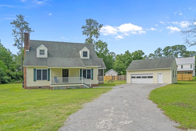 124 Wicklow Way, Pawleys Island, SC 29585 - cape cod home with a porch, a detached garage, crawl space, an outdoor structure, and a chimney