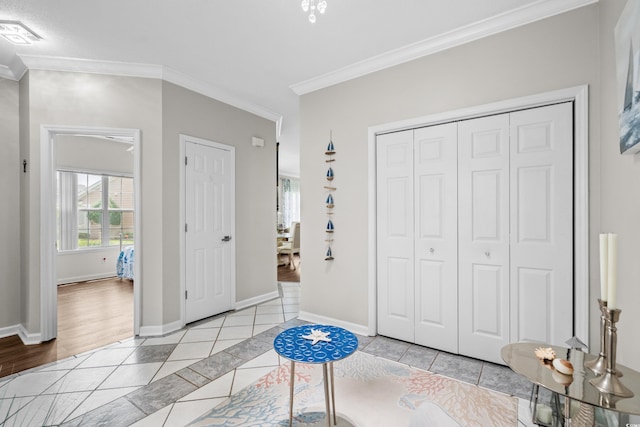 4648 Lightkeepers Way Unit 39A, Little River, SC 29566 - unfurnished bedroom featuring light tile patterned floors, crown molding, multiple windows, and a closet