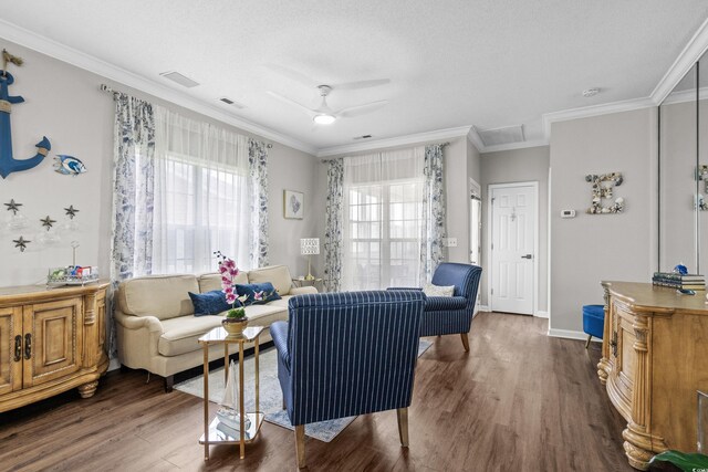 4648 Lightkeepers Way Unit 39A, Little River, SC 29566 - living area featuring wood finished floors, crown molding, and a ceiling fan