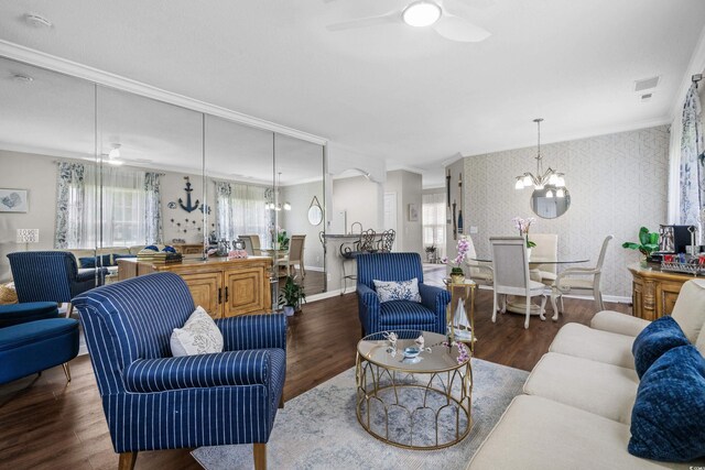 4648 Lightkeepers Way Unit 39A, Little River, SC 29566 - living room with wallpapered walls, a ceiling fan, a chandelier, plenty of natural light, and crown molding