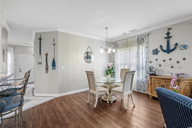 4648 Lightkeepers Way Unit 39A, Little River, SC 29566 - dining room with a chandelier, crown molding, wood finished floors, and wallpapered walls