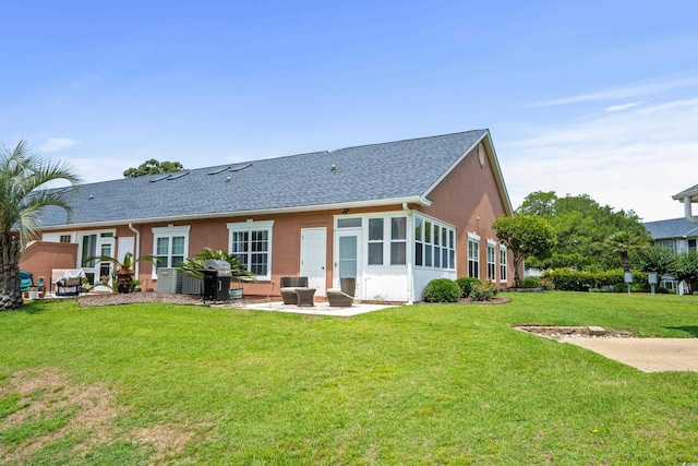 4648 Lightkeepers Way Unit 39A, Little River, SC 29566 - back of house featuring a patio, a shingled roof, a yard, and stucco siding