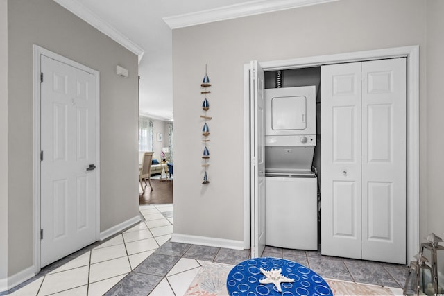 4648 Lightkeepers Way Unit 39A, Little River, SC 29566 - washroom featuring stacked washer and clothes dryer, ornamental molding, and light tile patterned flooring