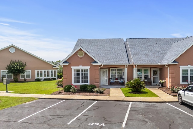 4648 Lightkeepers Way Unit 39A, Little River, SC 29566 - view of building exterior with uncovered parking
