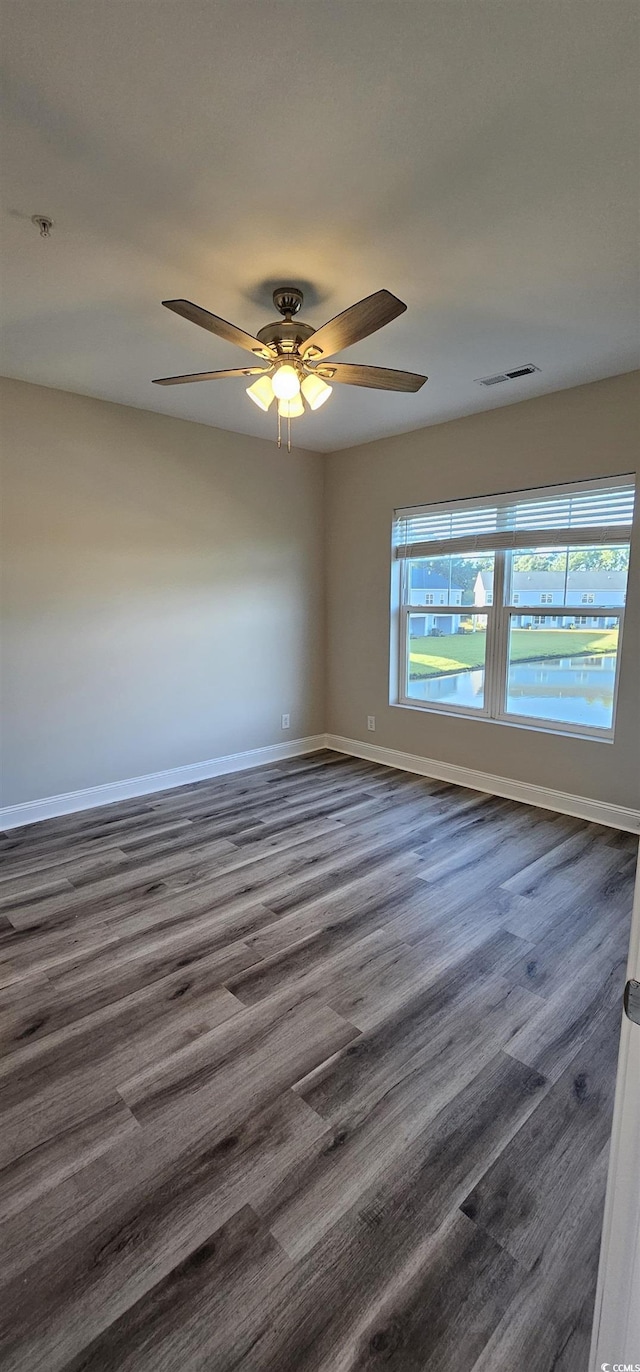 340 Kiskadee Loop, Conway, SC 29526 - unfurnished room featuring ceiling fan, baseboards, dark wood-style floors, and fire sprinkler in ceiling