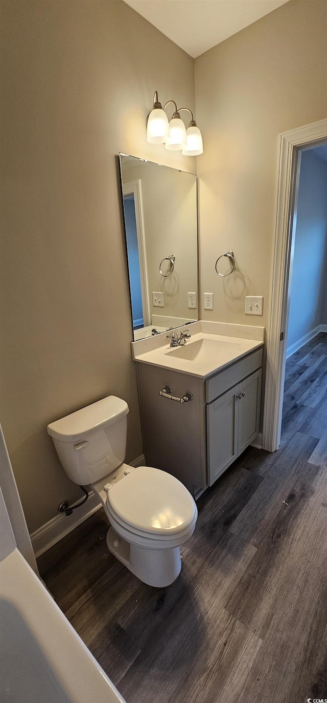 340 Kiskadee Loop, Conway, SC 29526 - bathroom with toilet, wood finished floors, vanity, and baseboards