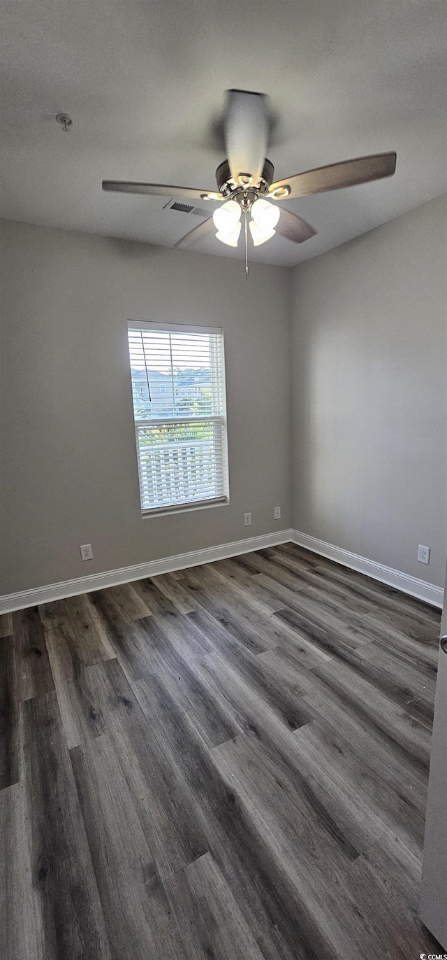 340 Kiskadee Loop, Conway, SC 29526 - empty room with ceiling fan, dark wood-style flooring, baseboards, and a pendent fire sprinkler