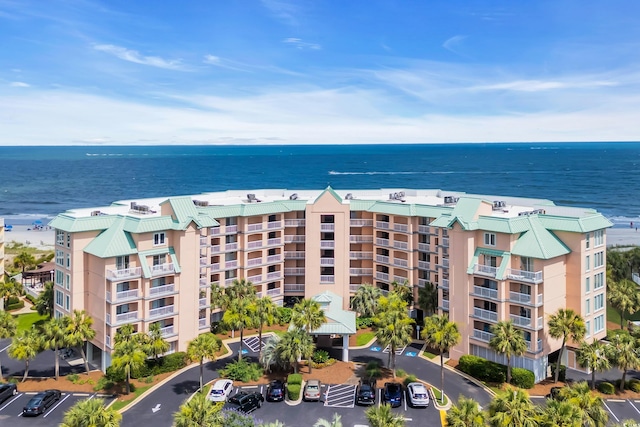 145 S Dunes Dr Unit 308, Pawleys Island, SC 29585 - view of apartment building / complex featuring a water view and uncovered parking