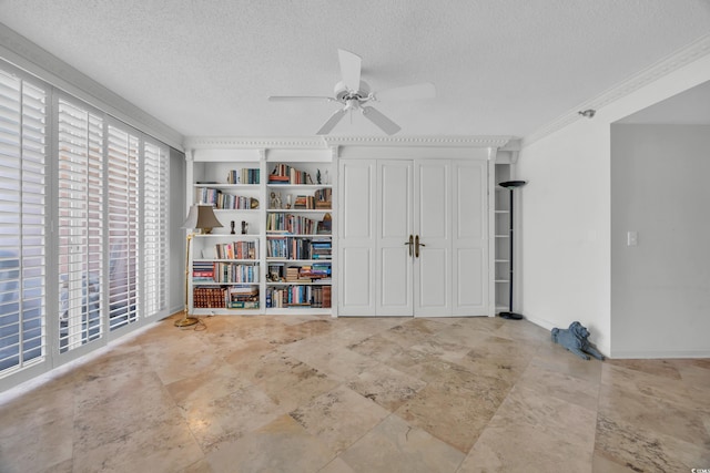 145 S Dunes Dr Unit 308, Pawleys Island, SC 29585 - unfurnished room featuring a textured ceiling, a ceiling fan, and ornamental molding