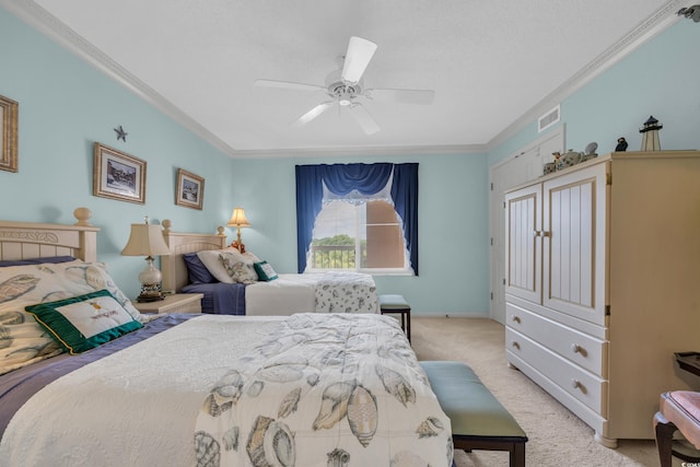 145 S Dunes Dr Unit 308, Pawleys Island, SC 29585 - bedroom featuring light carpet, ornamental molding, and a ceiling fan