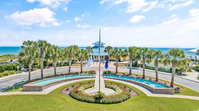 145 S Dunes Dr Unit 308, Pawleys Island, SC 29585 - view of home's community with a water view and a lawn