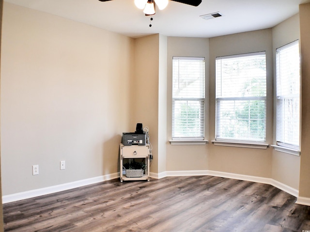230 Vermillion Dr, Little River, SC 29566 - empty room featuring a ceiling fan and wood finished floors