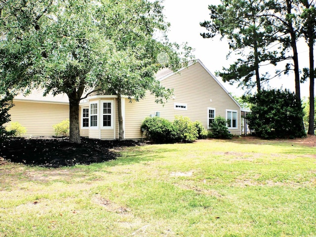230 Vermillion Dr, Little River, SC 29566 - view of side of home with a yard