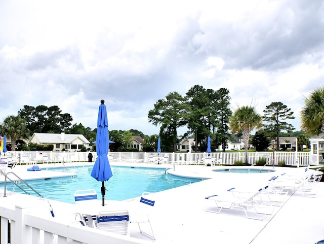 230 Vermillion Dr, Little River, SC 29566 - community pool with a patio area