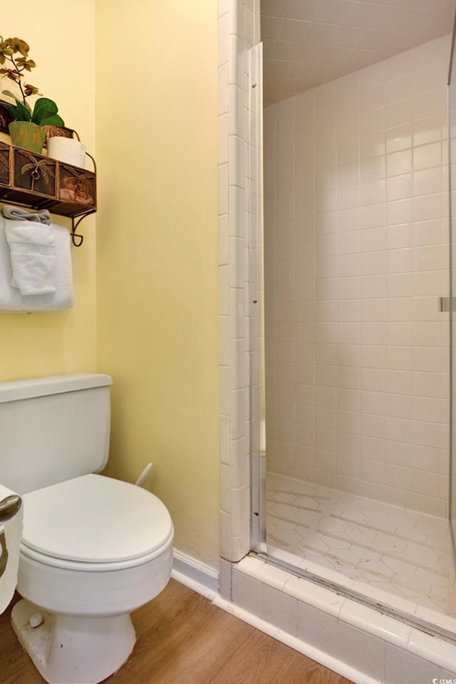 211 76th Ave N Unit A3, Myrtle Beach, SC 29572 - bathroom with wood finished floors and a stall shower