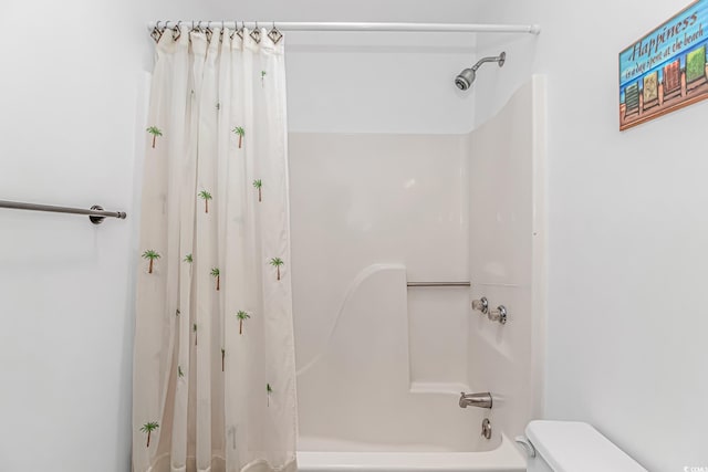 4309 Beverly Ct, North Myrtle Beach, SC 29582 - bathroom featuring shower / bathtub combination with curtain and toilet