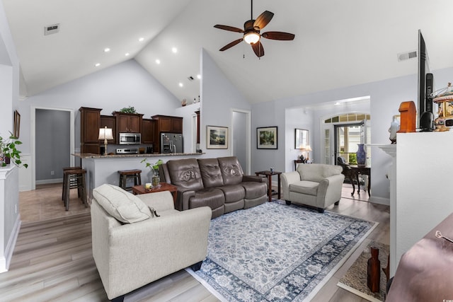 341 Bahama Dr, Murrells Inlet, SC 29576 - living area featuring high vaulted ceiling, ceiling fan, recessed lighting, light wood-style floors, and baseboards