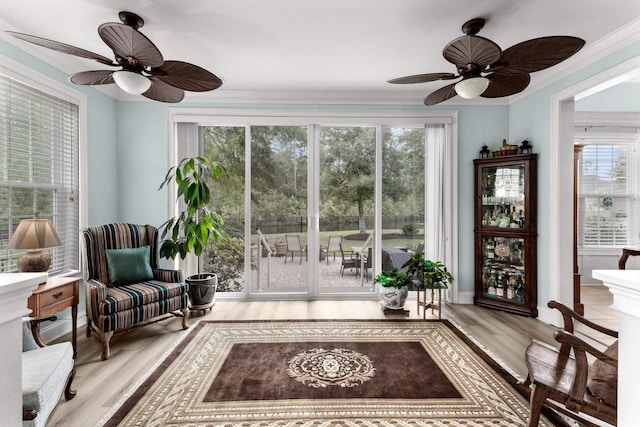 341 Bahama Dr, Murrells Inlet, SC 29576 - sitting room with ceiling fan, wood finished floors, healthy amount of natural light, and crown molding