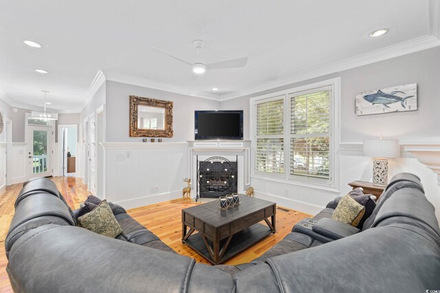 17 Trigger Fish Ln, Murrells Inlet, SC 29576 - living area featuring a fireplace, wood finished floors, ceiling fan, healthy amount of natural light, and recessed lighting