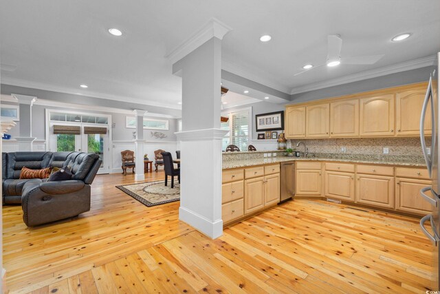 17 Trigger Fish Ln, Murrells Inlet, SC 29576 - kitchen featuring decorative columns, light brown cabinetry, stainless steel dishwasher, ornamental molding, and open floor plan