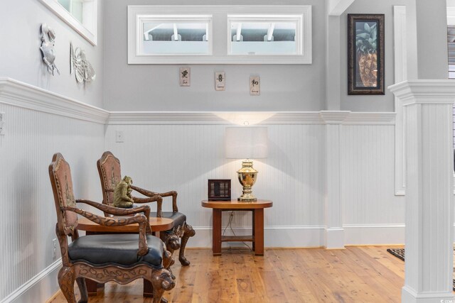17 Trigger Fish Ln, Murrells Inlet, SC 29576 - sitting room with a wainscoted wall and wood finished floors