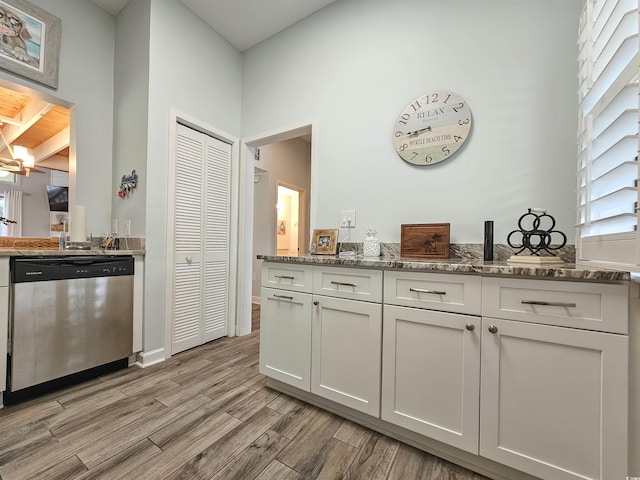 323 Wendover Ct Unit 10-A, Myrtle Beach, SC 29572 - bar area featuring stainless steel dishwasher and light wood-style floors