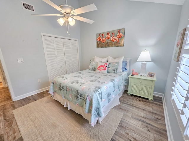 323 Wendover Ct Unit 10-A, Myrtle Beach, SC 29572 - bedroom with wood finished floors, a closet, and a ceiling fan