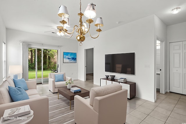 1302 River Oak Dr Unit 4B, Myrtle Beach, SC 29579 - living area with a chandelier, baseboards, and light tile patterned floors