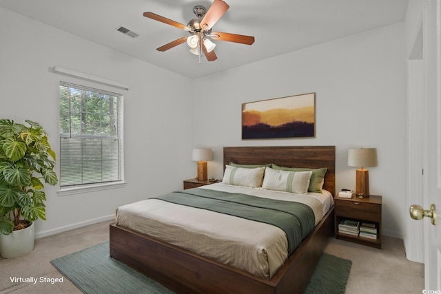 1302 River Oak Dr Unit 4B, Myrtle Beach, SC 29579 - bedroom featuring light colored carpet, baseboards, and a ceiling fan