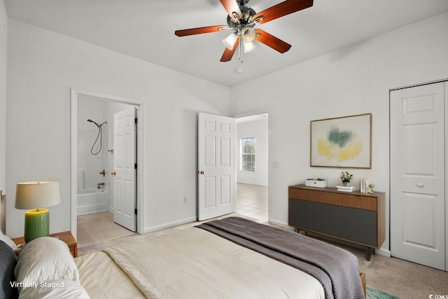 1302 River Oak Dr Unit 4B, Myrtle Beach, SC 29579 - bedroom with light carpet, baseboards, connected bathroom, and a ceiling fan