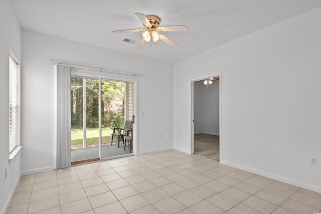1302 River Oak Dr Unit 4B, Myrtle Beach, SC 29579 - empty room featuring ceiling fan, baseboards, and light tile patterned floors