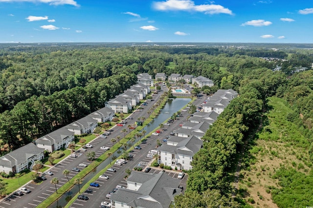 1302 River Oak Dr Unit 4B, Myrtle Beach, SC 29579 - aerial perspective of suburban area with a heavily wooded area
