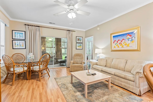 405 Pipers Ln Unit 405, Myrtle Beach, SC 29575 - living area featuring light wood finished floors, ornamental molding, and a ceiling fan
