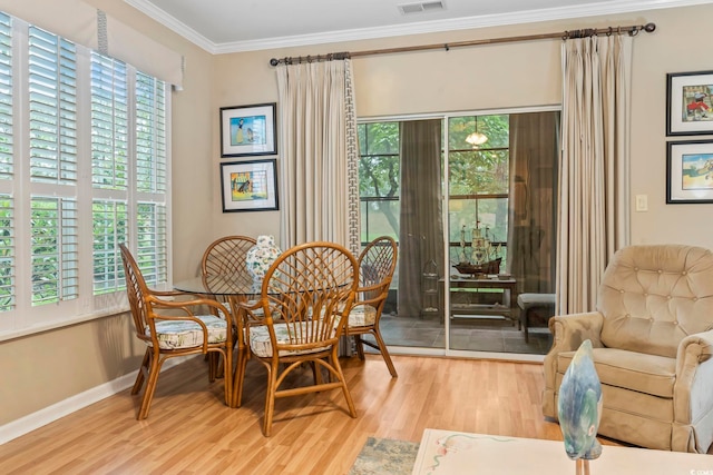 405 Pipers Ln Unit 405, Myrtle Beach, SC 29575 - dining area featuring wood finished floors, ornamental molding, and baseboards