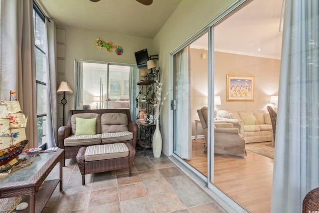 405 Pipers Ln Unit 405, Myrtle Beach, SC 29575 - sunroom featuring stone finish floors