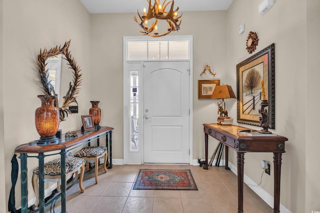 773 Wintercreeper Dr, Longs, SC 29568 - foyer entrance featuring a chandelier and light tile patterned flooring